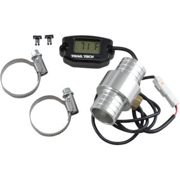 The Trail Tech Temperature Meter Surface Mount Black 25 mm includes a waterproof sensor, LCD display showing 71°F, two metal hose clamps, pre-attached wires, and small connectors—all displayed on a white surface.