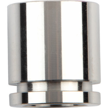 Silver metal brake caliper piston with smooth cylindrical shape and polished finish.
