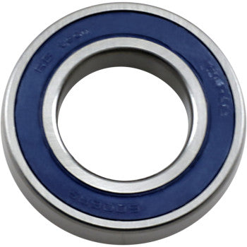 A close-up of the Parts Unlimited Wheel Bearing Double Seal 30x55x13 highlights its circular metal design, blue rubber double seals, and central hole—demonstrating quality construction and reliable sealing.