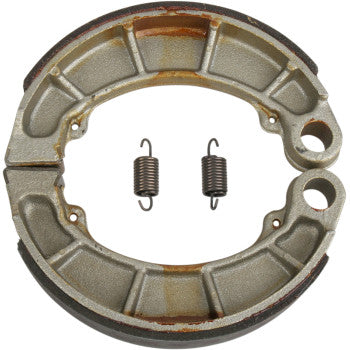 A pair of Yamaha 9207 Brake Shoes by DP Brakes arranged in a circle with two coil springs at the center, providing fade-free performance on a plain white background.