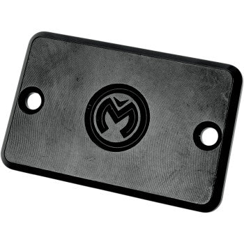 The Yamaha Master Cylinder Cover Black by Moose Offroad is a black metal reservoir cover with two side holes and a central stylized M logo. Made in the USA, it's the perfect quad accessory for custom builds.