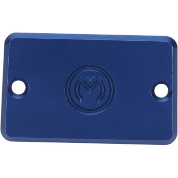 The Yamaha Master Cylinder Cover Blue by Moose Offroad is a rectangular blue metal plate with rounded corners, two side holes, and an engraved circular logo—perfect as a quad accessory or reservoir cover.