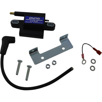 Suzuki Ignition Coil Kit by Dynatek includes a coil, metal bracket, two bolts, two nuts, spark plug wires, a small wiring harness with ring and spade connectors, and wiring adapters—all displayed on a white background.