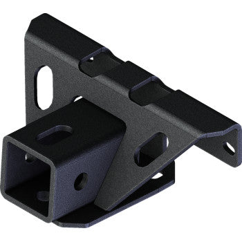 The Kawasaki Brute Force Hitch Rear Receiver 2 by Kfi Products is a durable black steel bracket with angled surfaces, cutouts, and mounting holes for easy vehicle or frame attachment. Installs easily and is shown against a white background.