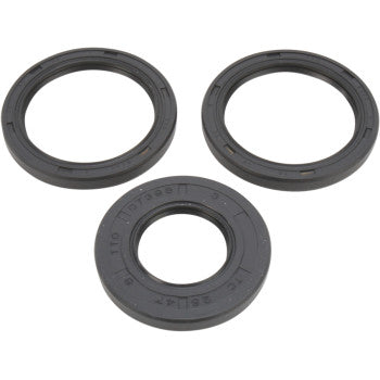 Three black seals from the Polaris Differential Seal Kit Front by Moose Offroad are arranged on a white background, with two at the top and one at the bottom. The smooth surfaces and edge markings suit differential service needs.