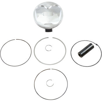 Silver metal piston with flat top, black wrist pin, and four circular piston rings arranged on white background.