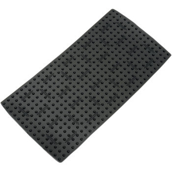 The Traction Pad All Purpose Sheet Black by Stompgrip is a rectangular black rubber mat with raised circular bumps for enhanced under-foot traction, similar to 3D Griptape Sheets.