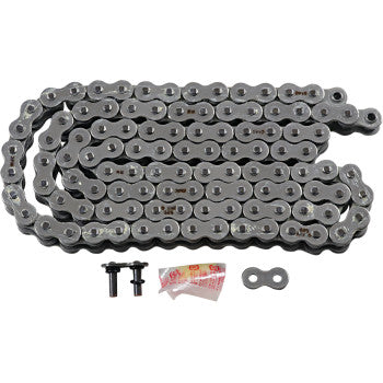 The 525 Max O Drive Chain 108 Links by RK is shown coiled with two black connector pins, a gray master link, and a small lubricant packet displayed in front, all set against a white background.