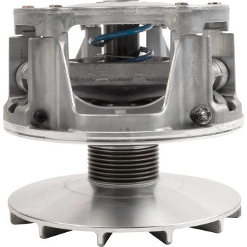 Silver metallic clutch assembly with circular fan blades and central spring mechanism.