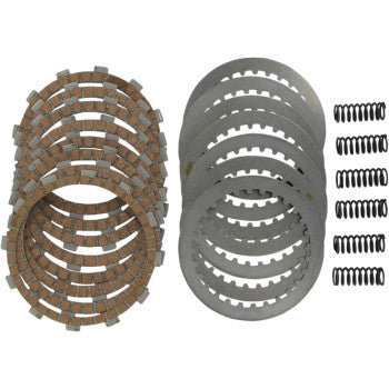 The Clutch Kit by DP Brakes features stacked friction plates, steel drive plates, and rows of small coil springs neatly arranged on a white background.