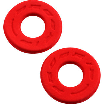Two bright red Handlebar Donuts Red by Pro Grip, round with large central holes and textured Lycra surfaces for cushioning and blister prevention, are placed side by side on a white background.