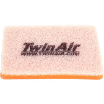 The Polaris Standard Air Filter by Twin Air features a rectangular design with a pink top layer, orange bottom layer, black Twin Air logo, and dual-stage filtration for enhanced protection against dirt.