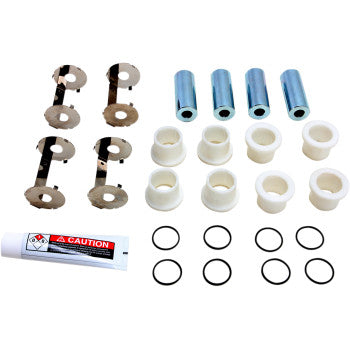 Front upper A-arm bearing kit with metal spacers, white plastic bushings, black metal clips, O-rings, and a tube of grease.