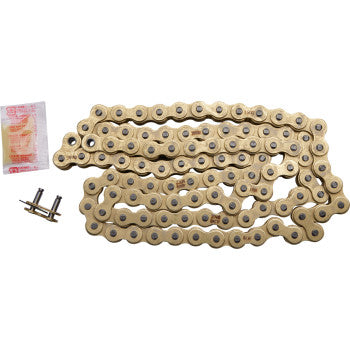 The 420 MXZ Heavy Duty Drive Chain 104 Links by RK, gold-colored chromoly steel with seamless rollers, plus a lubricant packet and clip connecting link, are displayed together on a white background.
