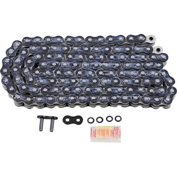 The 525 Max Z Drive Chain 120 Links Black & Chrome by RK, shown on a white background, includes two metal pins, a connecting link, three O-rings, and a small packet—likely lubricant or grease. Designed for high-horsepower street bikes.