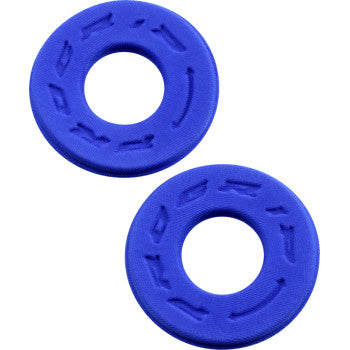 Two Handlebar Donuts Blue by Pro Grip, round with a center hole and indented markings, are arranged diagonally on a white background. Their Lycra coating helps prevent blisters and adds extra comfort during use.