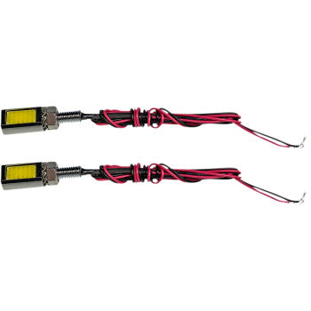 A pair of Custom Dynamics LED Tag Light - Chrome units with black and red wires coiled neatly and metal tag bolt mounts, pictured on a white background, ideal for license plate illumination.