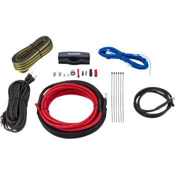 Amplifier Installation Kit by Kicker, featuring oxygen-free copper cables, blue remote wire, yellow-black ground wire, MANL fuse holder, connectors, zip ties, and black wire—arranged neatly on a white background.