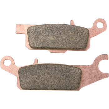 Copper-colored metal backing with dark gray sintered friction pads shaped for off-road brake use.