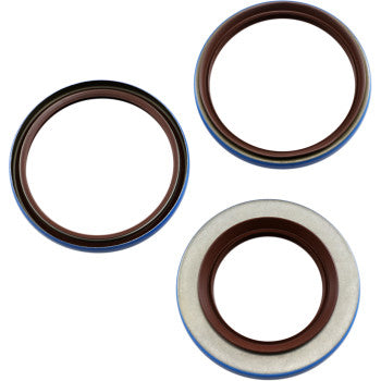 Three Yamaha Differential Seal Kit Rear by Moose Offroad are shown, each with brown inner rings and blue-edged outer rims; one features a metallic outer ring. These TC rubber oil seals are displayed against a white background.