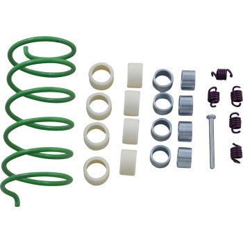 Green coil spring with multiple white cylindrical spacers, silver metal washers, and small black tension springs arranged in