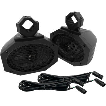 The UTV Speakers by Metrix include two black oval two-way speakers with hexagonal mounting brackets, mesh fronts, and long cables with connectors—ideal weatherproof motorcycle speakers for clear audio on the road.