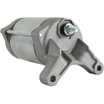 The Polaris Starter Motor by Parts Unlimited features a cylindrical metal body with mounting brackets and a threaded bolt, built to OEM specs with an insulated armature and a metallic gray finish.