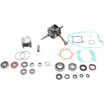 Complete Yamaha Blaster 200 engine rebuild kit with piston, crankshaft, gaskets, seals, and bearings on white background.