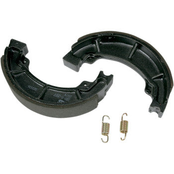 Black semi-circular metal brake shoes with textured friction lining and two small metal tension springs.
