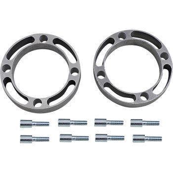 The Polaris Wheel Spacer Easy Fit 1.5 4/156 Front & Rear Kit by Dura Blue includes two round metallic spacers with multiple cut-out holes and eight bolts—perfect for use with nut extenders and displayed on a white background.