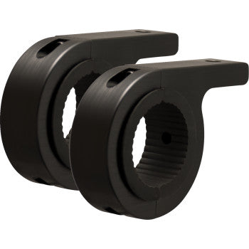 A pair of black Vision X Clamp Mount 1-3/4 with notched interiors and side extensions, adjustable in diameter, are positioned side by side on a white background.