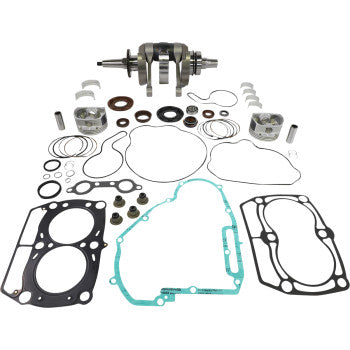Complete Polaris Sportsman Ranger engine rebuild kit with metal crankshaft, pistons, seals, and gaskets arranged on white.