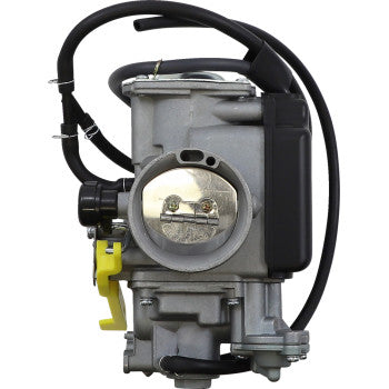 A close-up view of the Honda Replacement Carburetor by Moose Offroad, featuring visible throttle and fuel lines, a silver metal body, and a black side component—ideal as a direct replacement for many OEM carburetors.