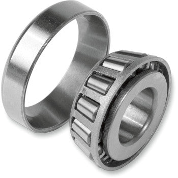 Metallic cylindrical roller bearing with inner and outer rings, designed for wheel hub assembly.