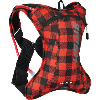The Outlander 2 Hydration Pack 2L in Flannel Red Black by Uswe features a red and black plaid design, black adjustable straps, a zippered front pocket, visible drinking tube, No Dancing Monkey harness, and diagonal gray USWE logo.