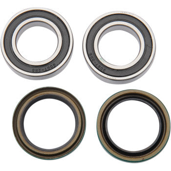 Set of four round rear wheel bearings and seals with metal and rubber components for off-road vehicle maintenance.