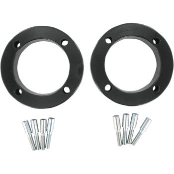 Two black, circular Yamaha Wheel Spacer Easy Fit 1.5 4/110 by Dura Blue are side by side, each with three holes. Below them, six silver bolts are arranged in two groups of three, all on a white background.