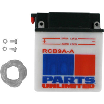 The Battery RCB9A A by Parts Unlimited is a white motorcycle battery with red and blue markings, labeled RCB9A-A and PARTS UNLIMITED, and includes two screws with a coiled clear tube for reliable starting power.