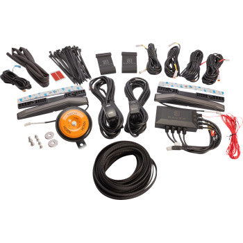 Complete Can Am Maverick X3 turn signal kit with amber lens, wiring harnesses, control modules, and mounting hardware.