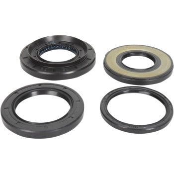 Four black circular seals of varying sizes from the Suzuki Differential Seal Kit Rear by Moose Offroad are arranged on a white background, with one featuring a metallic inner ring—perfect for differential maintenance.