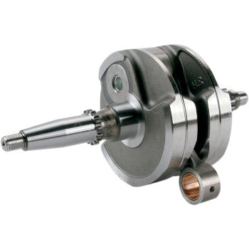 Polished metal Yamaha crankshaft assembly with dual counterweights and integrated bearing housing.