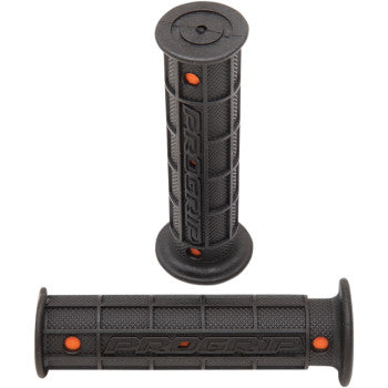 Two black Pro Grip ATV Grips 727 with textured surfaces, orange accents, and PROGRIP embossed on the side. Designed for 7/8 bars; one grip is upright and the other is flat.