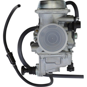 Silver metal Honda replacement carburetor with attached black fuel hoses and a round, transparent throttle body cover.