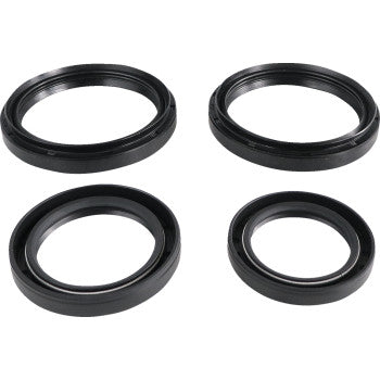 Four black circular seals of varying sizes from the Epi Differential Seal Kit Front and Rear are arranged in two rows on a white background, ideal for differential rebuilds.