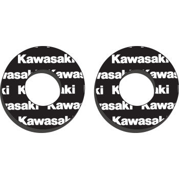 The Kawasaki Grip Donuts Black White by Factory Effex are two black circular grips with center holes, each displaying "Kawasaki" in bold white lettering for enhanced grip and added style.