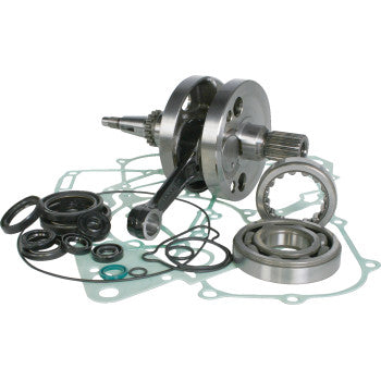 The Honda TRX Crankshaft Kit by Wiseco includes a crankshaft assembly, connecting rods, bearings, seals, O-rings, and a bottom-end gasket kit, all arranged on a white background.
