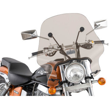 A motorcycle featuring a 17 Smoke Hellfire Windshield by Slipstreamer, chrome handlebars, rear-view mirrors, orange turn signals, a black leather seat, and a brown fuel tank with a silver emblem.