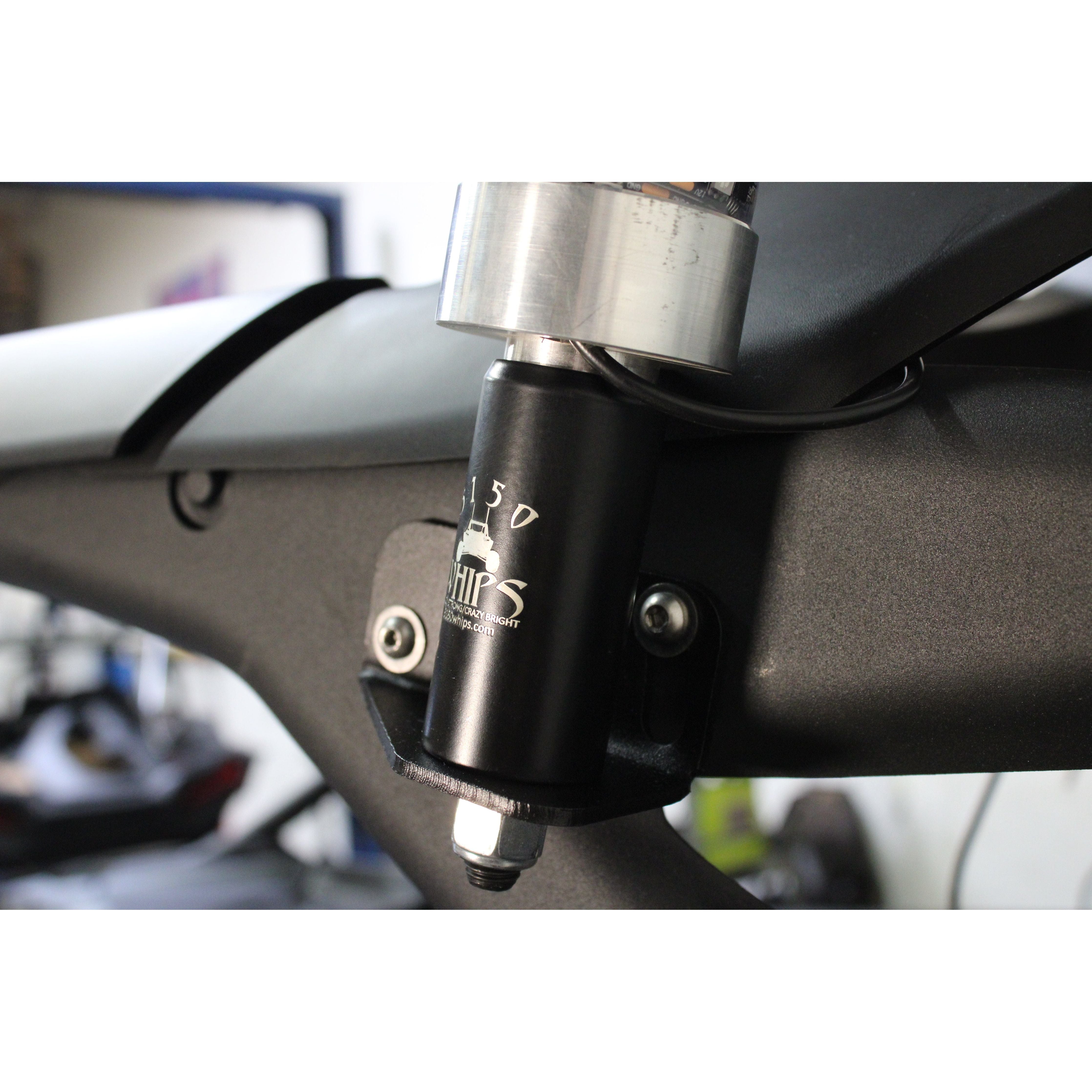 Close-up of a Can-Am Maverick R Whip Mount by 5150 Whips, finished in heavy duty matte black powder coat for enhanced durability, attached to the frame with bolts and wiring.