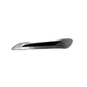 A brushed silver Cover-Hinge,Sbag,RH,Mhrtz by Polaris, featuring a black line and Indian with Native American head engraving—perfect for Indian motorcycle enthusiasts.