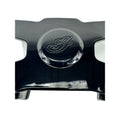 A close-up of the Polaris Cowl Mount, Bobber, Upper in black, showcasing a glossy plastic finish with an embossed cursive "J" at the center, reminiscent of premium Polaris OEM parts, set against a plain white background.